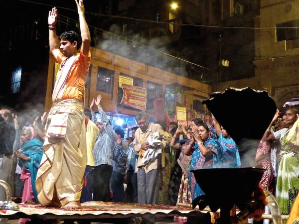 Priest leading the ganga aarti ceremony Priest leading the ganga aarti ceremony