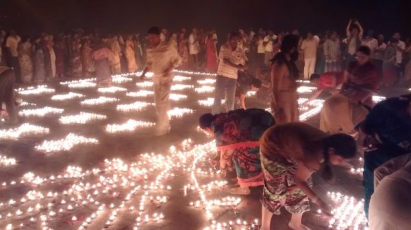 Hindu pilgrims gather at the ghats to light candles and pray Hindu pilgrims gather at the ghats to light candles and pray