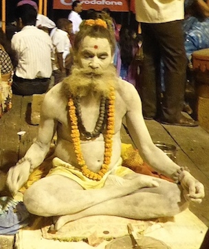 Yogi meditating at the ghats Yogi meditating at the ghats