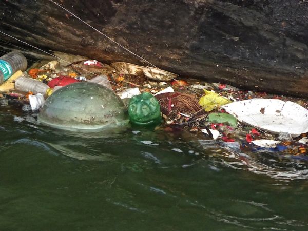 Pollution and rubbish in the Ganges river Pollution and rubbish in the Ganges river