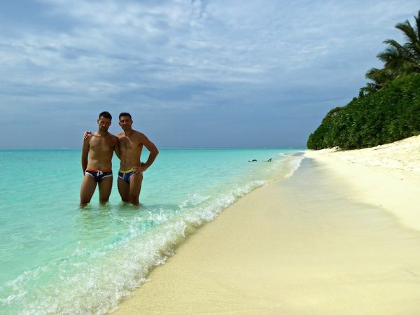 Nomadic Boys on the beach of Thoddoo island