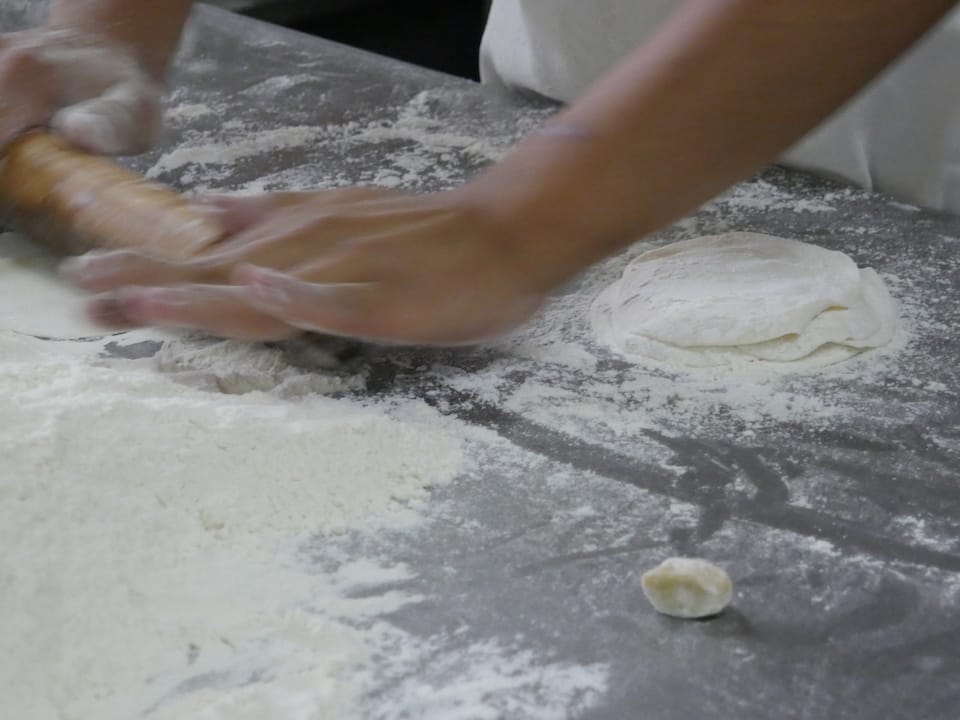 Rolling out the quesadilla dough recipe for ecuadorian quesadillas dough