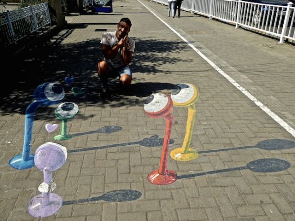 Stefan being admired by 3D pavement graffiti in Ulan Bator