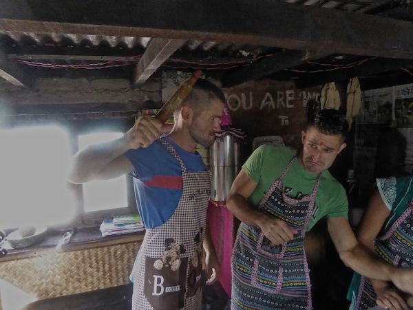 Nomadic Boys fighting during cooking class