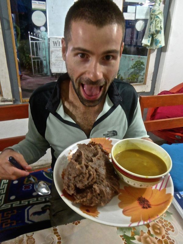 Trying dhido with vegetable curry