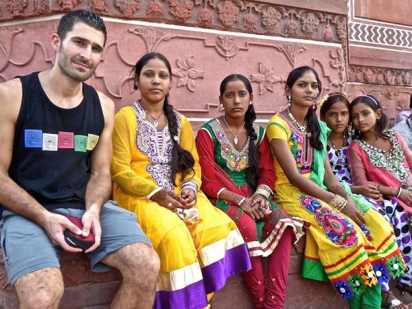 Stefan posing with this group of Indian girls at the Taj Mahal Hate love India bright colours everywhere Taj Mahal Agra