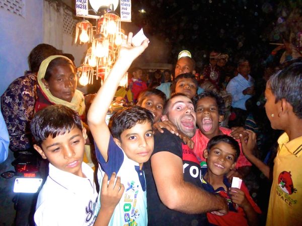 Sebastien and his new friends at a wedding at Amber village Hate love India wedding in Amber village near Jaipur