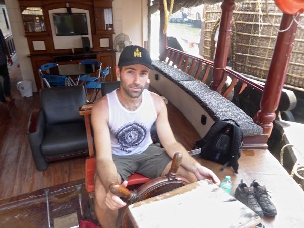 Captain Seb at the helm of 'Why Not' Captain Seb at the helm of 'Why Not'