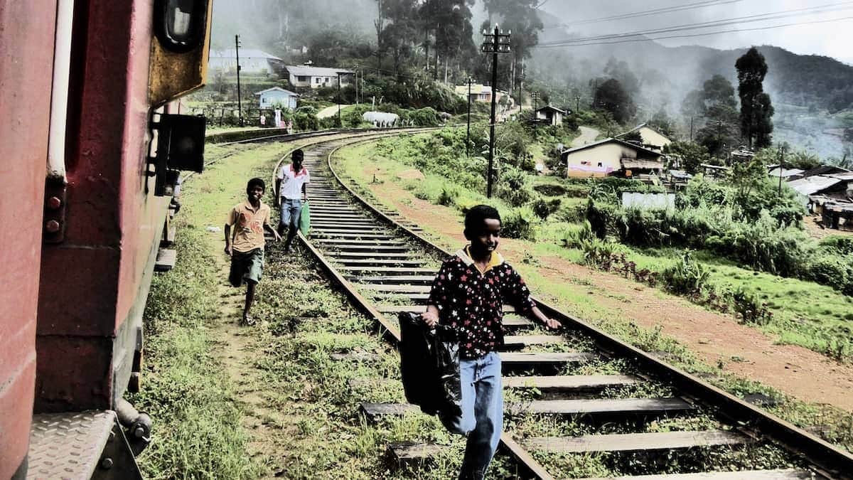 Schoolchildren running to catch the train