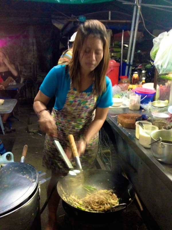 Woman making fresh Pad Thai at Krabi night market best streetfood in Thailand fresh Pad Thai at Krabi night market