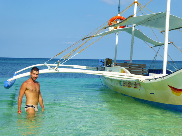 Sebastien with bangka boat at Carubao island