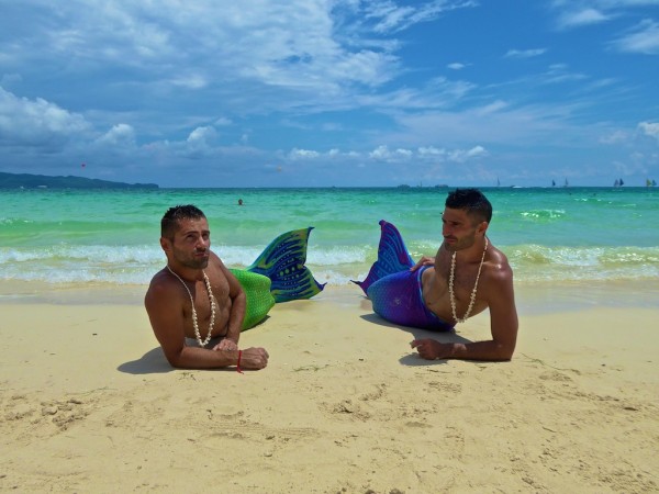 The Nomadic Boys posing as mermaids on Boracay