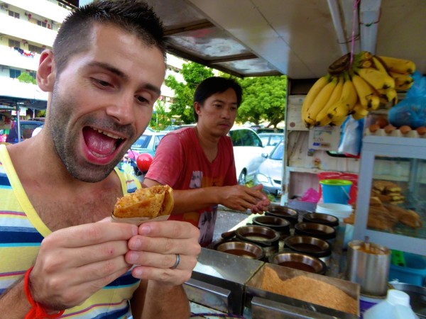 Sebastien trying a Chinese crepe in Penang Sebastien trying a Chinese crepe in Penang