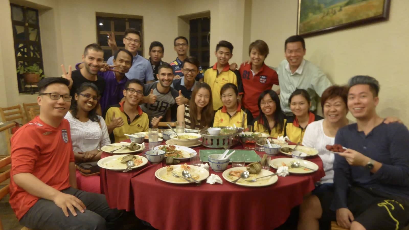 Malaysian family sitting down for a meal in Ipoh