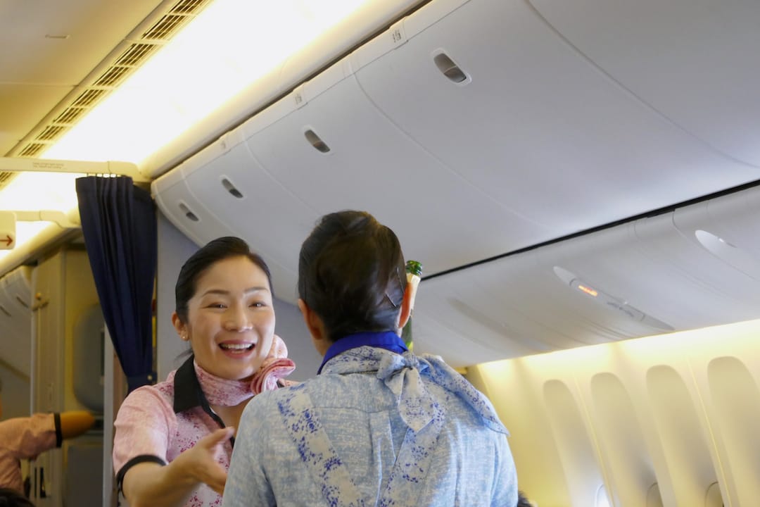 ANA business class review flight attendants award winning service in Asia