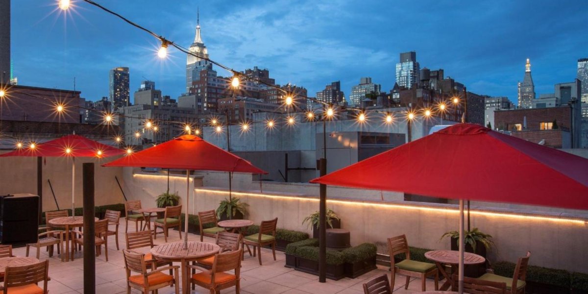 NYC Pride guide - stay at the GEM Hotel in Chelsea for gorgeous rooftop terrace views over the city.