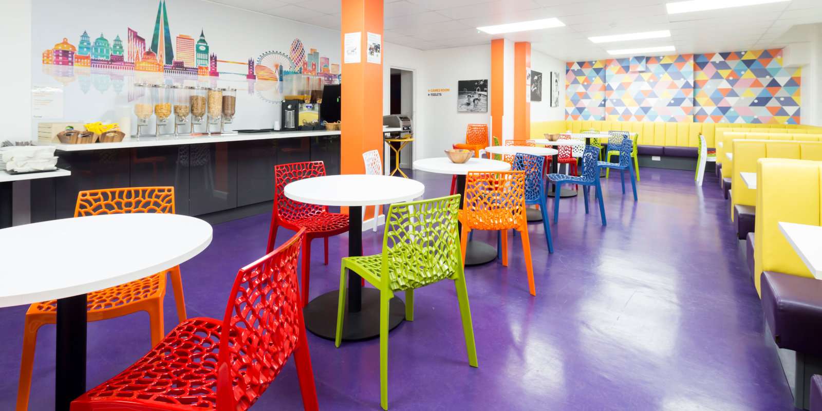 The decor of gay friendly SoHostel in London just screams gay pride with those rainbow colours!