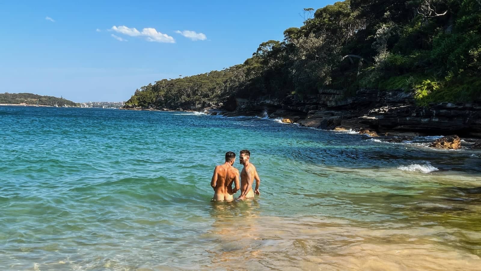 Gay couple at the Obelisk gay nude beach in Sydney.