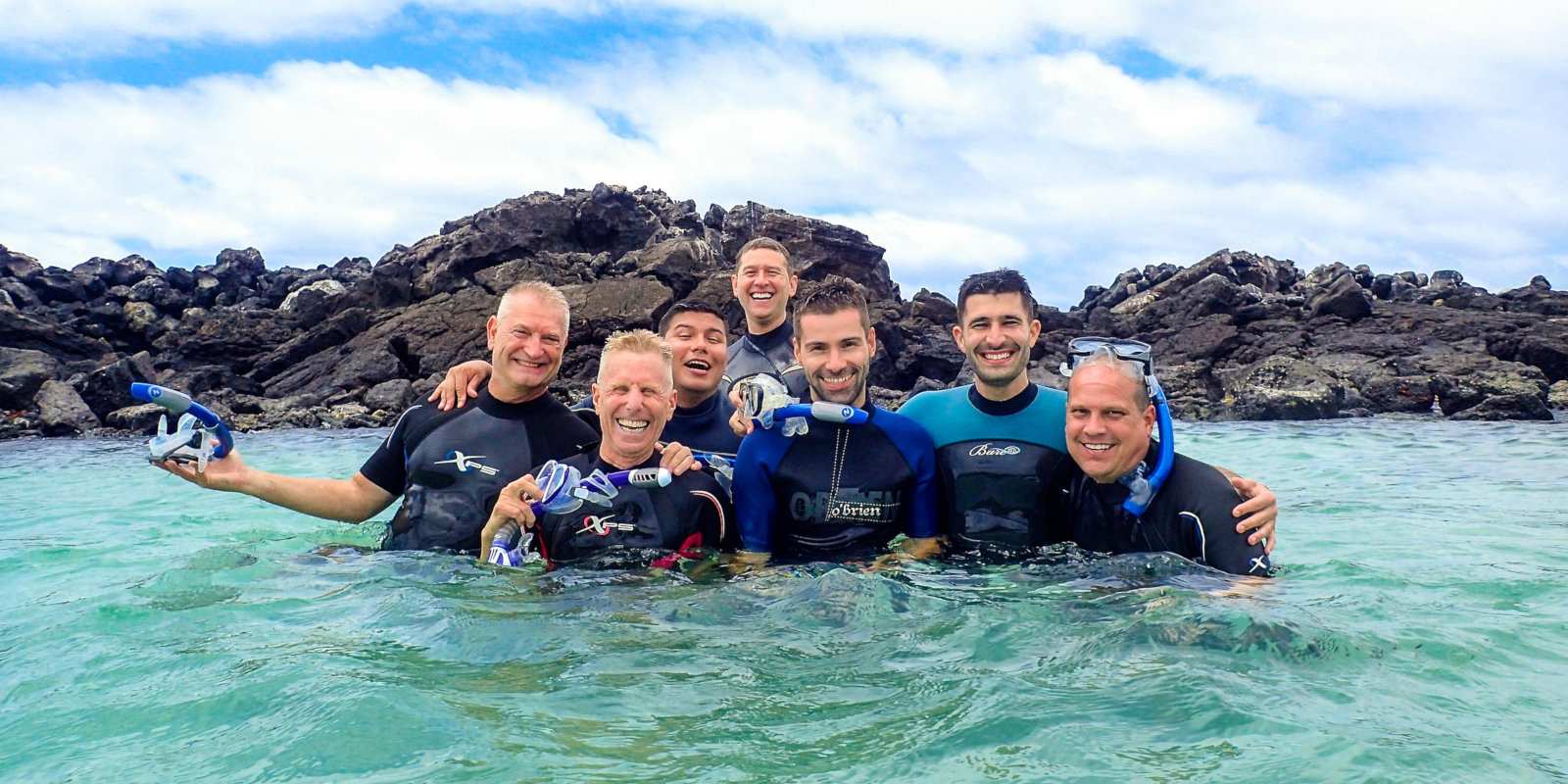 Snorkelling with our new gay friends on an Ecuador Nomadic gay cruise of the Galapagos