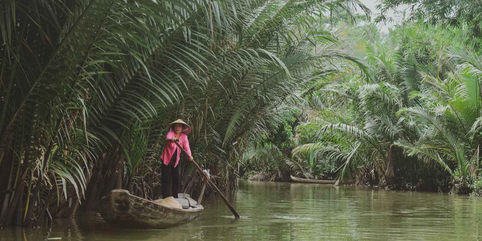 You'll spot locals punting down the River Mekong on this luxury gay river cruise