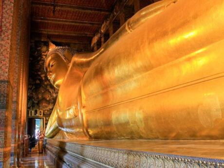 The 46-metre long reclining Buddha covered in gold leaf is another must-visit spot in Bangkok