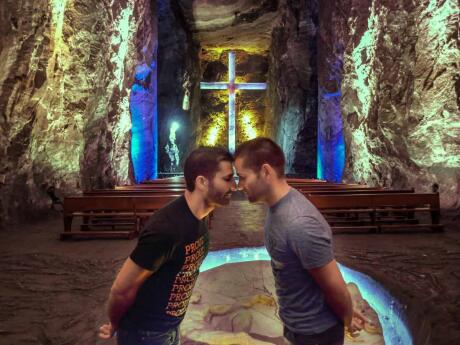 Gay couple Nomadic Boys having a romantic moment at the Catedral De Sal in Bogota Colombia