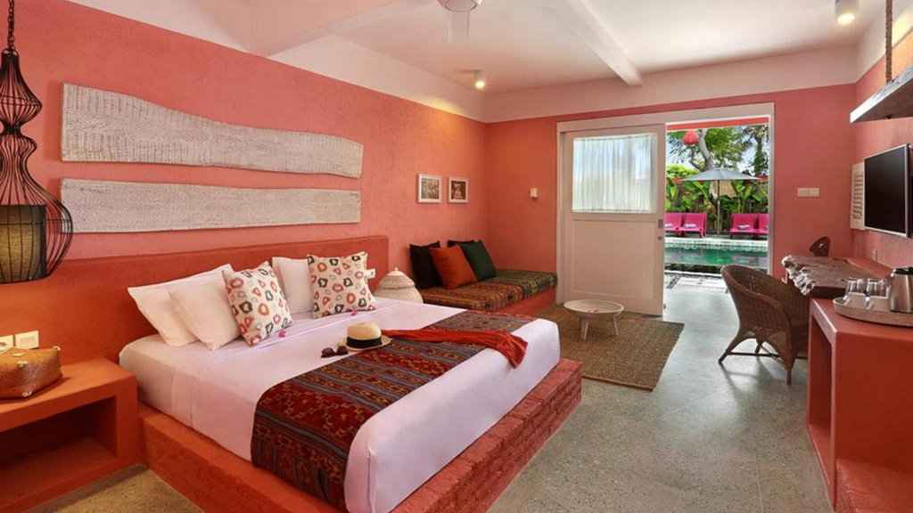 A luxurious poolside bedroom at PinkCoco Gili Trawangan.