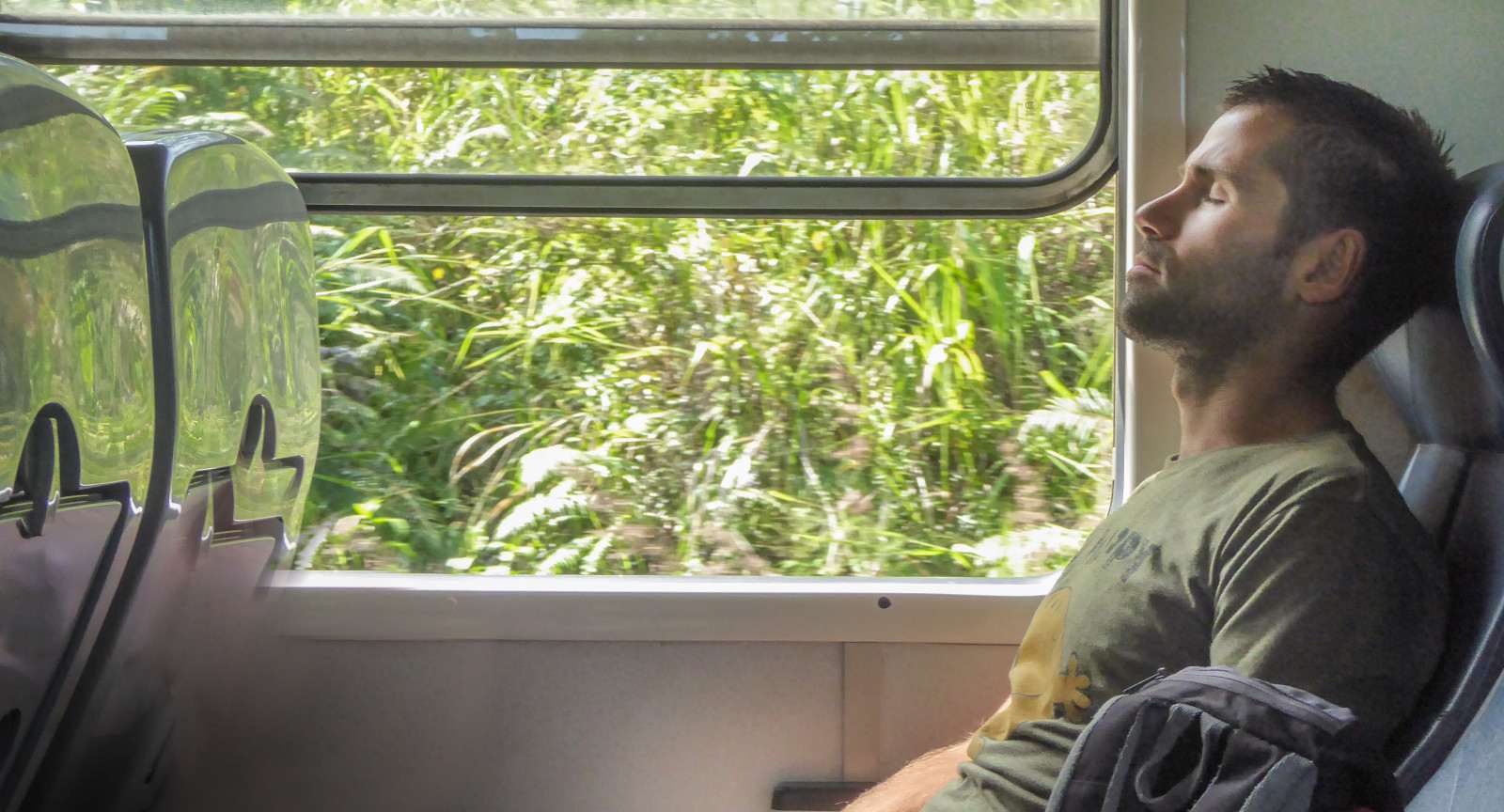 Sebastien from Nomadic Boys sleeping in second class during his train ride from Kandy to nuwara Eliya