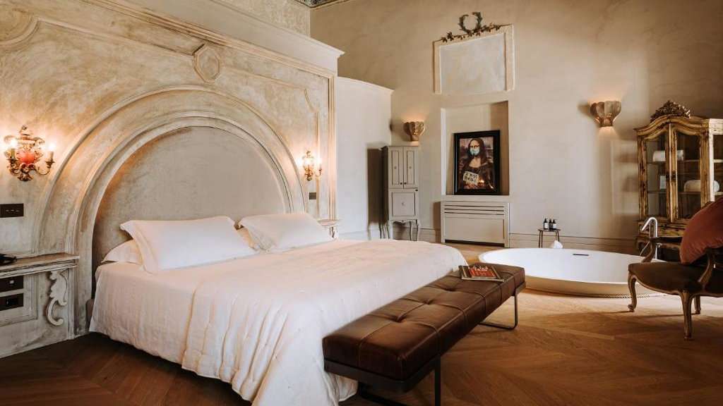 A huge and opulent bedroom at the Paragon 700 Boutique Hotel in Ostuni, Puglia.