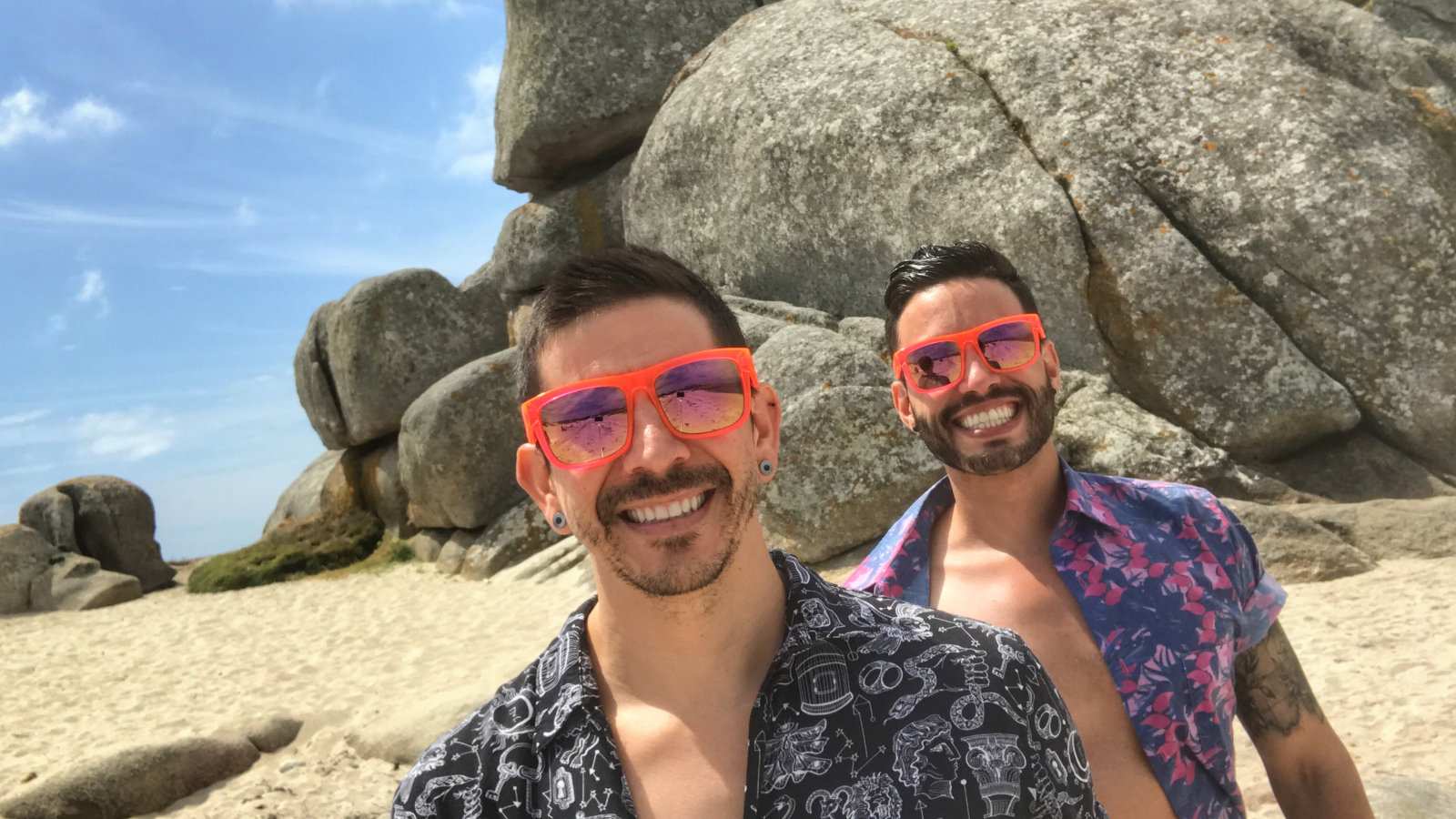 Auston of Two Bad Tourists with his gay boyfriend at the beach in Gran Canaria. 