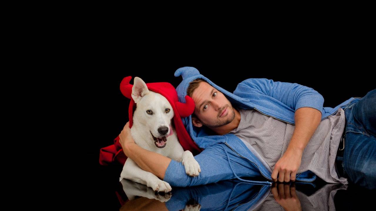 Max, the famous gay instagrammer, pictured with his very cute white dog. 