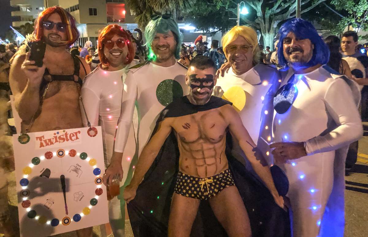 Gay friends dressed as Twister board game