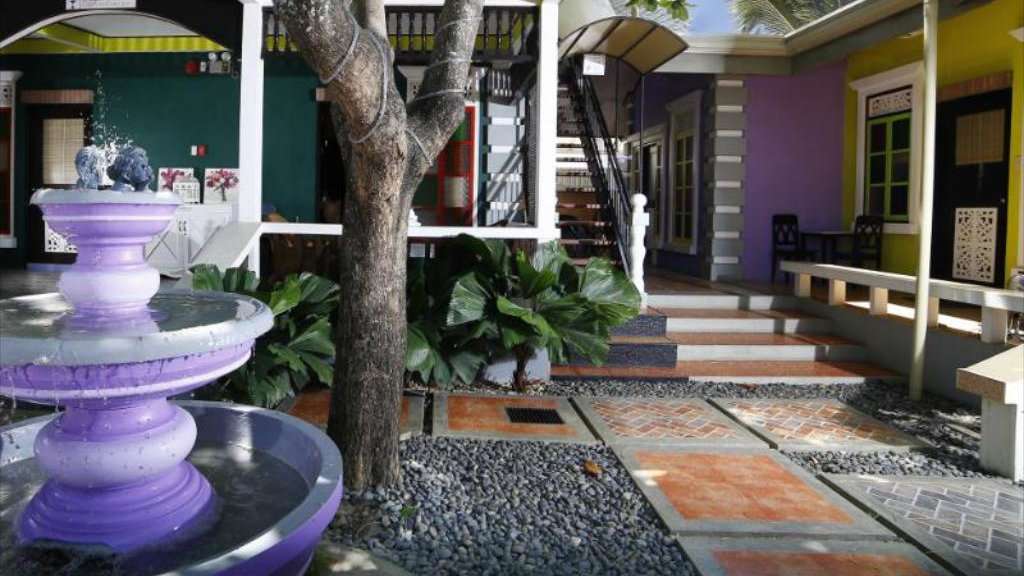 The Purple Fountain Courtyard Inn is a colorful, affordable and gay friendly hotel in Palawan