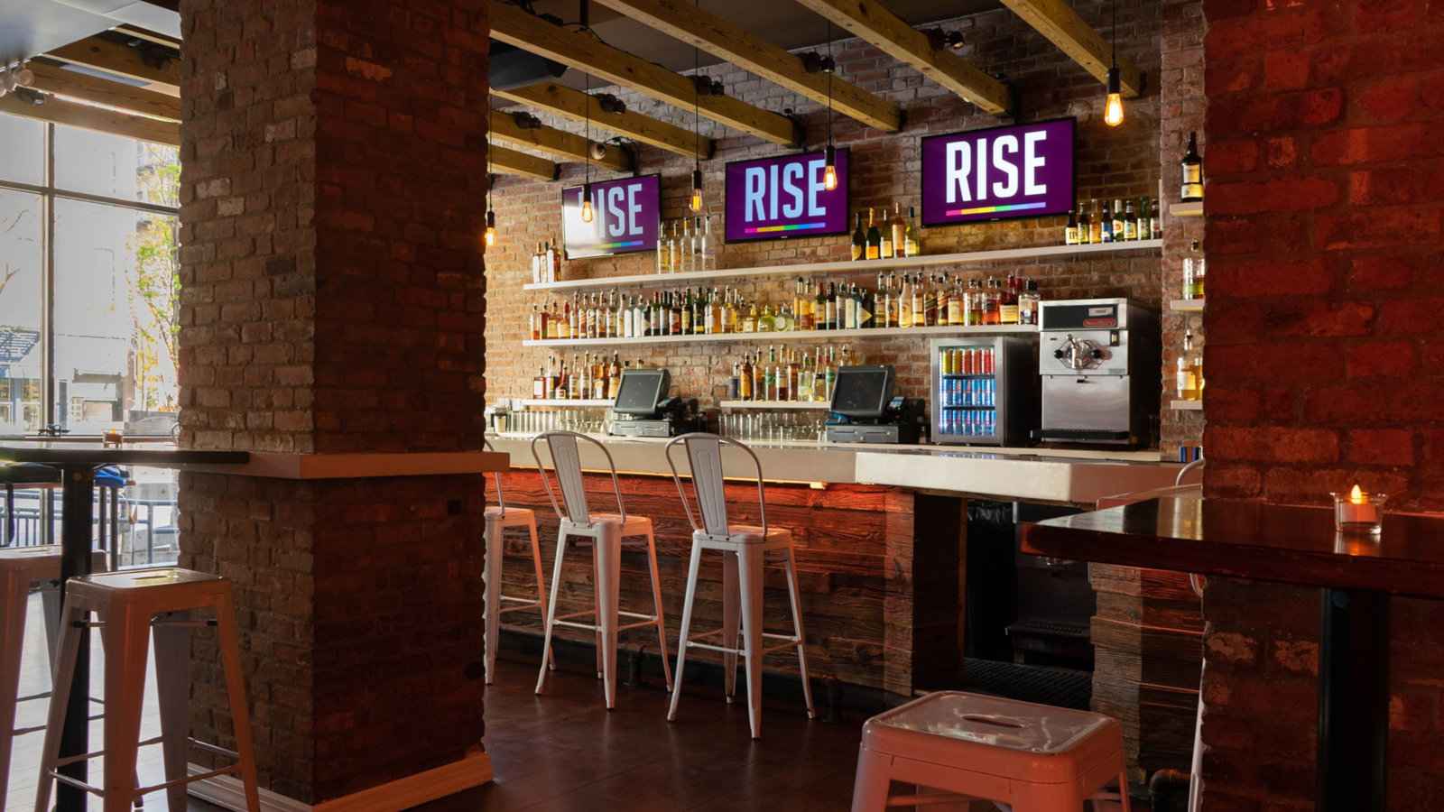 Rise Bar is one of the best gay bars in New York City that gets packed with fun