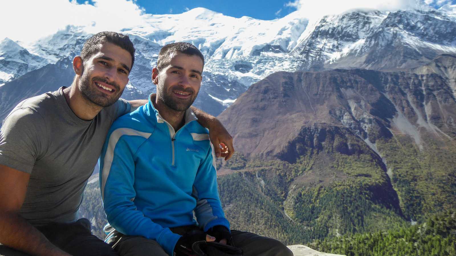 Gay couple trekking in the Himalayas in Nepal