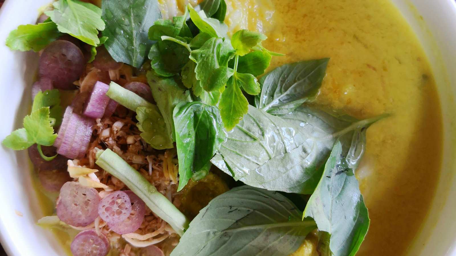 Num banh chok is a delicious noodle dish from Cambodia that's usually served for breakfast