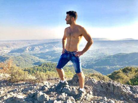 Stefan hiking in Vancouver shirtless.