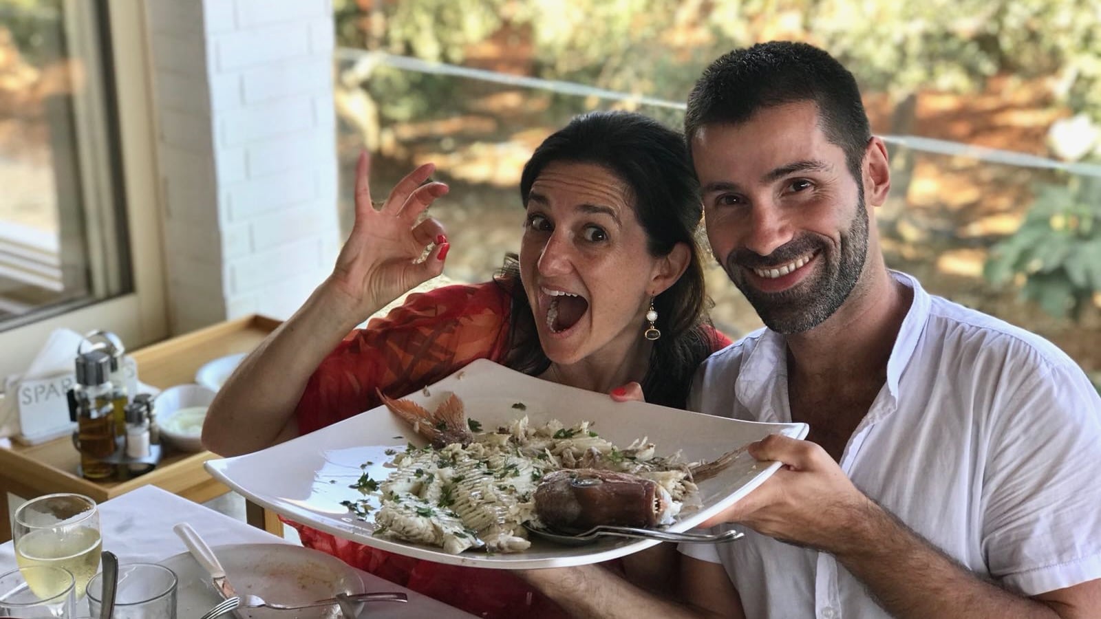 Seby eating fish with Stefan's sister at Agia Napa in Cyprus.