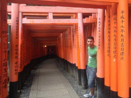 The Fushimuri Inari Shrine in Kyoto is a must-visit for an iconic photo of the red/orange torii gates