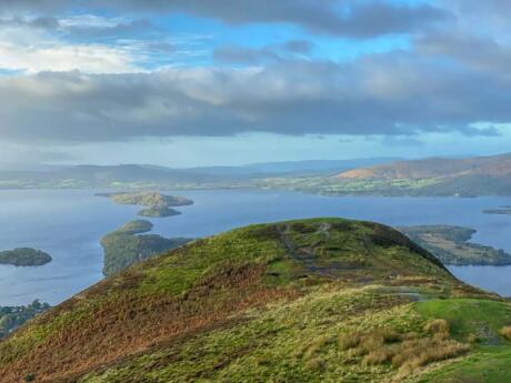 Enjoy stunning views like this one of Conic Hill while exploring Scotland's Loch Lomond