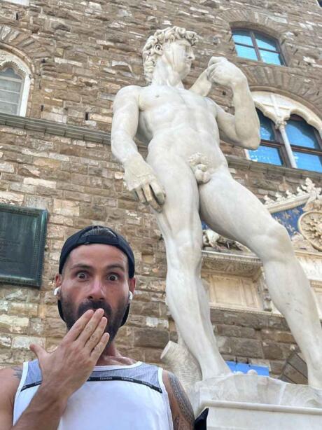 Seby posing for a 'shocked' selfie in front of the famous naked David statue!