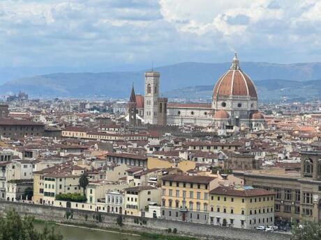 The rooftops of Florence including the famous Duomo as seen from a viewpoint from above the city.