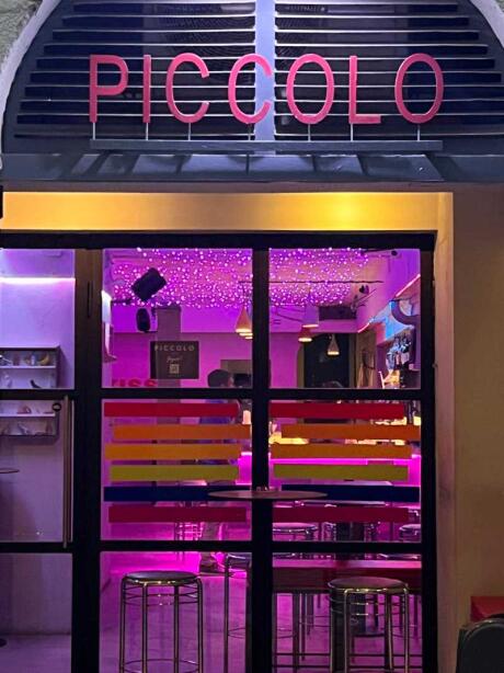 The colorful entrance of Piccolo gay bar in Florence.