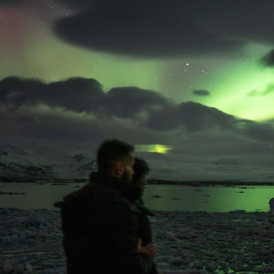Nomadic Boys watching the northern lights in iceland