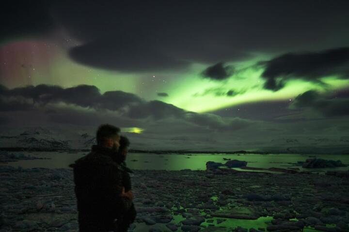 Nomadic Boys watching the Northern lights in Iceland
