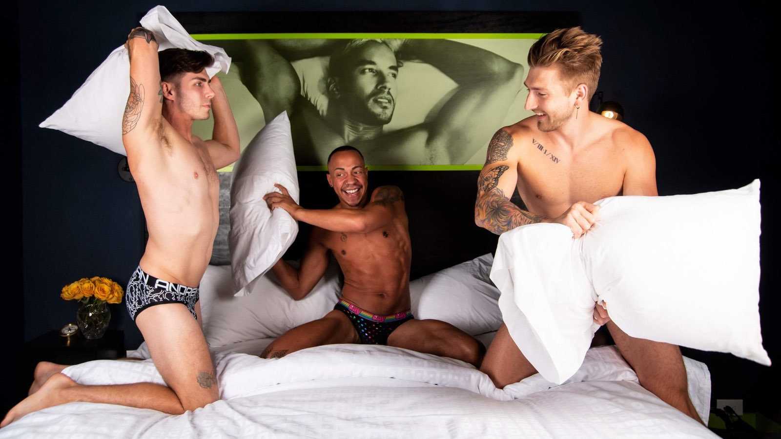 Three fit men in their underwear having a pillow fight at the Mari Jean gay hotel in St Petersburg, Florida.