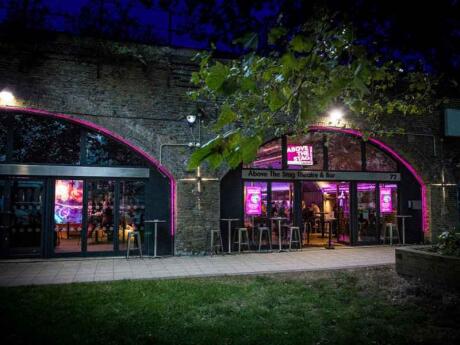 The front outdoor seating area of Above the Stag, a wonderful theater in London that showcases queer performances.