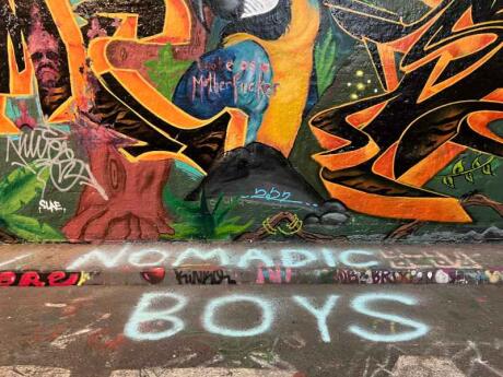 The Nomadic Boys street art tag at The Banksy Tunnel on Leake Street, a cool spot in London.