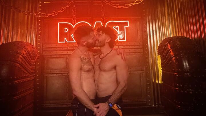 Gay couple kissing at the Roast gay club in London.