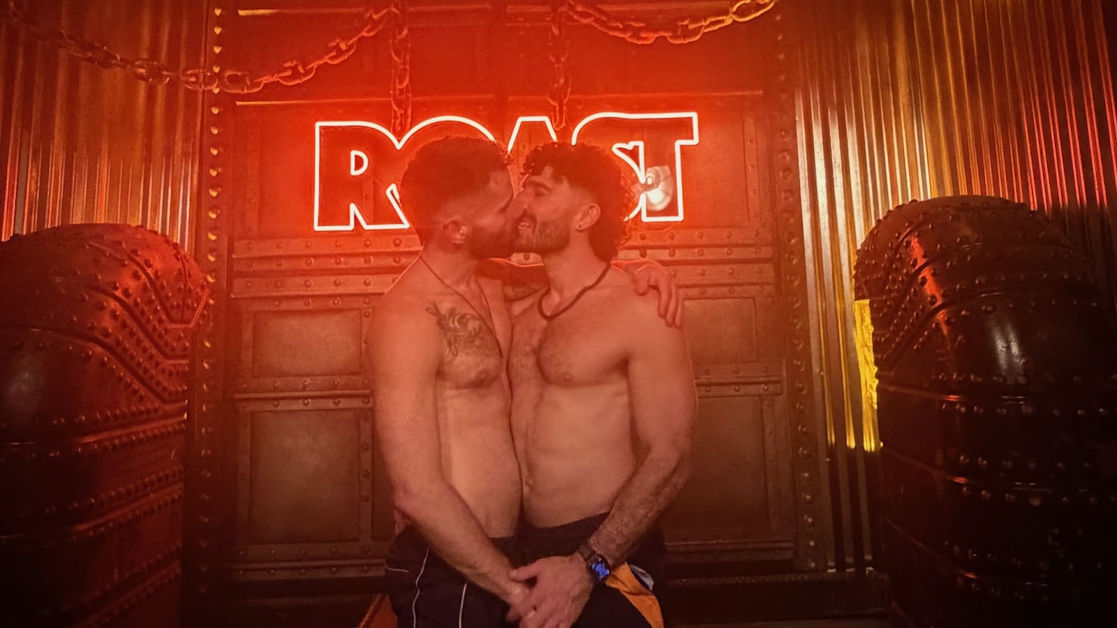 Gay couple kissing at the Roast gay club in London.
